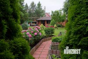 Коттедж 365м², 3-этажный, участок 11 сот.  