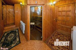 Коттедж 330м², 3-этажный, участок 6 сот.  