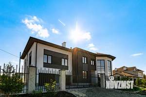 Коттедж 355м², 2-этажный, участок 15 сот.  